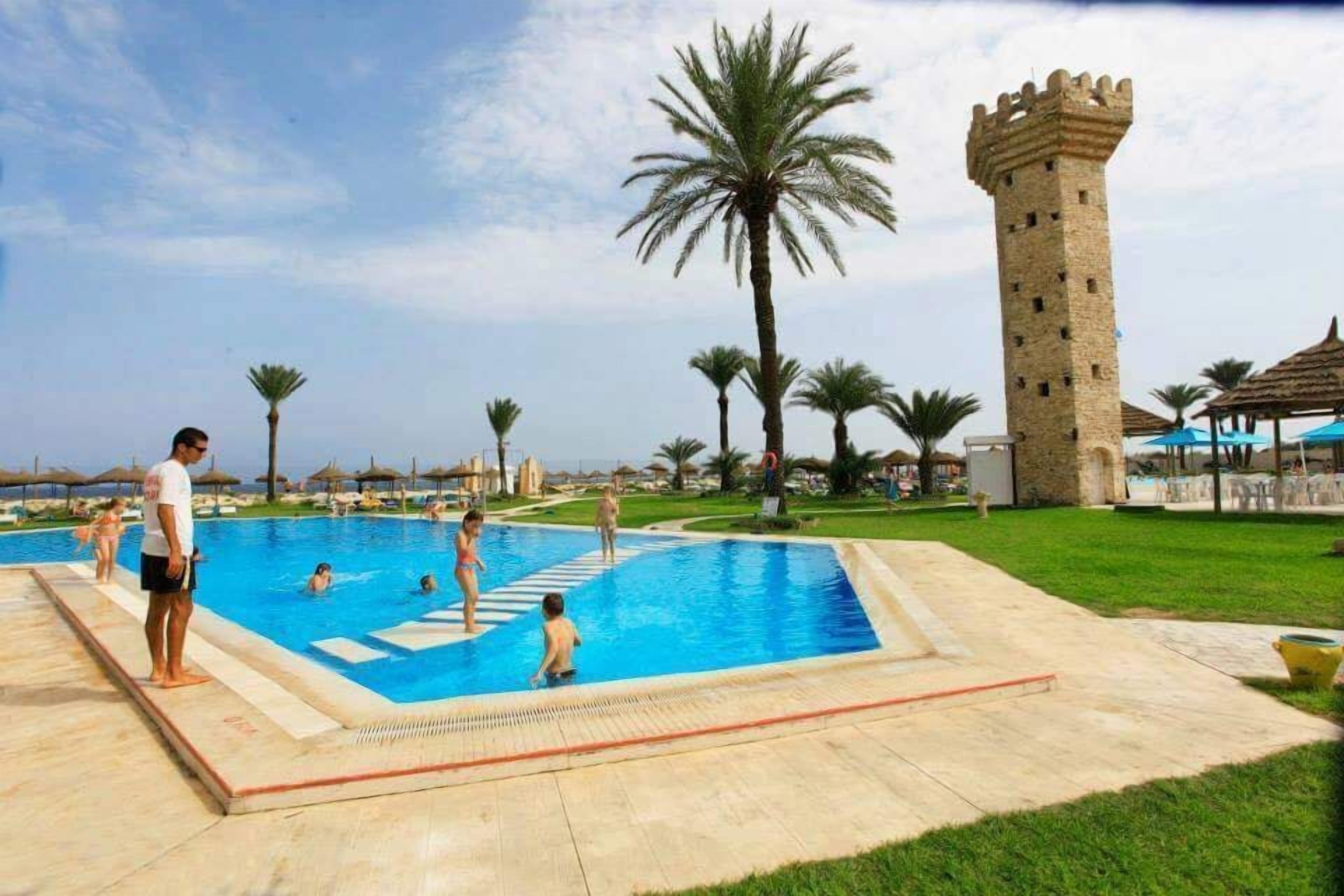 2 outdoor pools, pool umbrellas, pool loungers