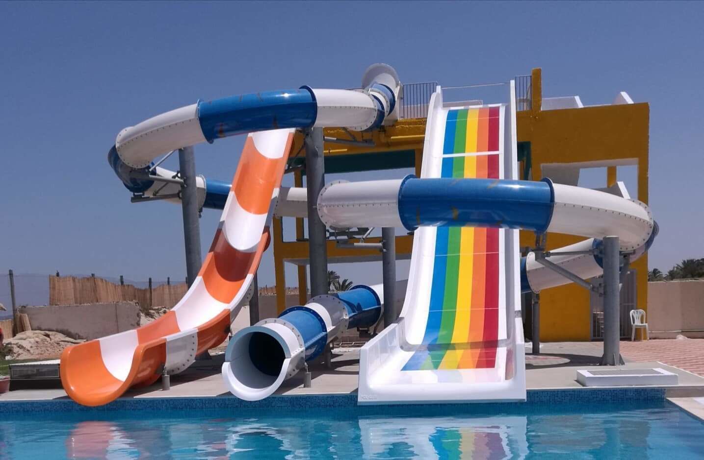 2 outdoor pools, pool umbrellas, pool loungers