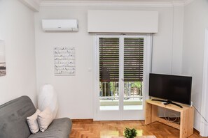 City apartman, 1 hálószobával | Nappalirész | Síkképernyős tévé