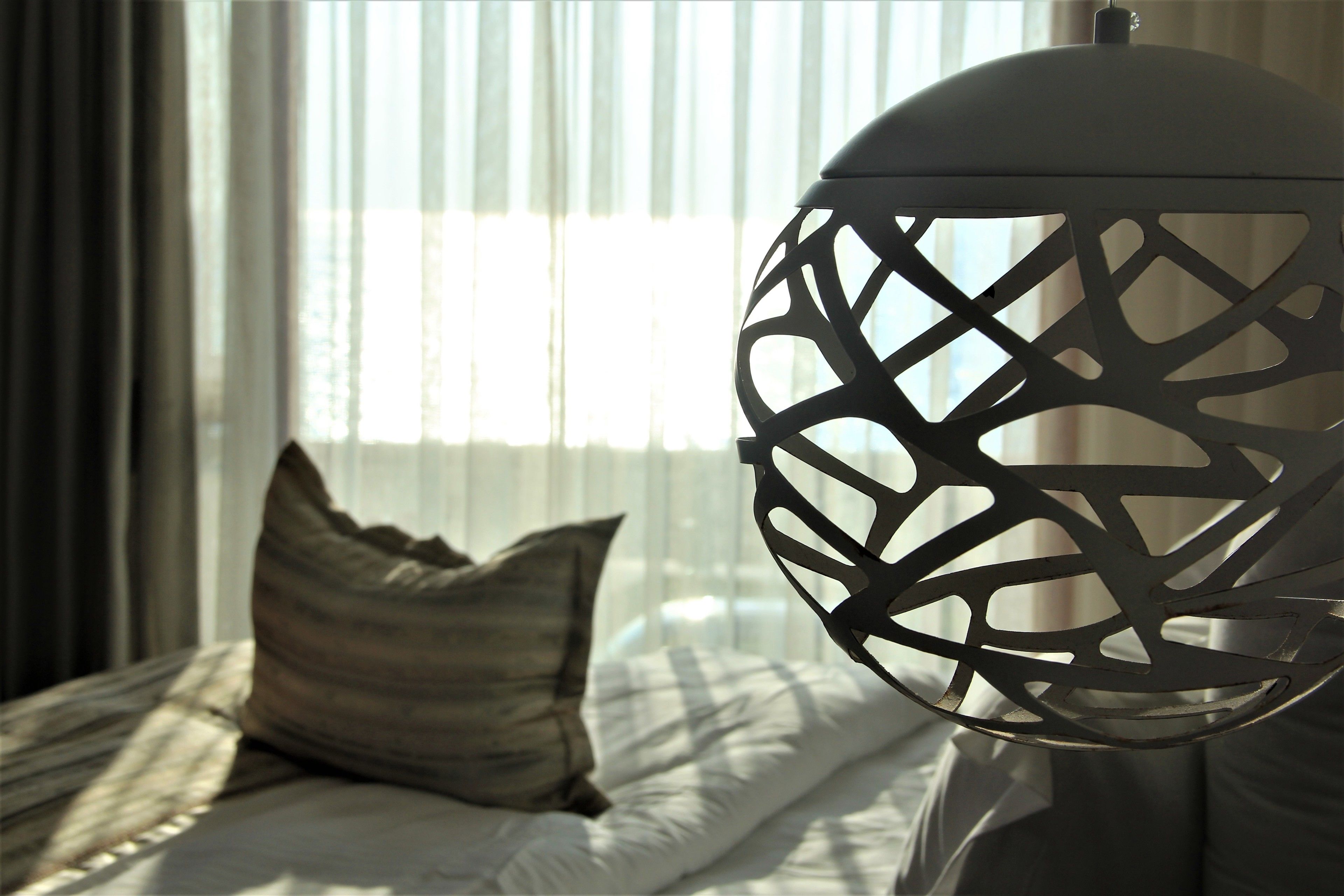 deluxe suite, city view | 1 bedroom, minibar, in-room safe, individually decorated