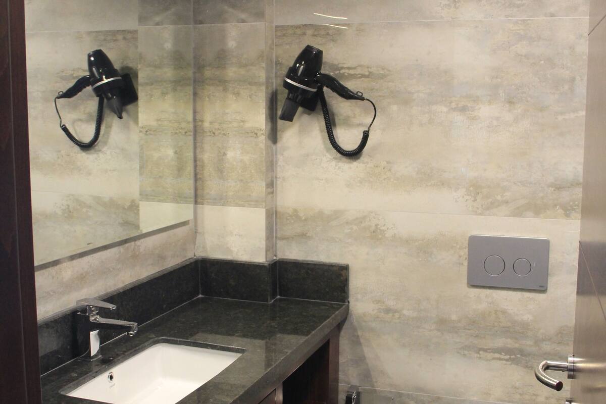 shower, free toiletries, hair dryer, dressing gowns