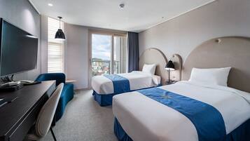 Standaard kamer, 2 eenpersoonsbedden | Een bureau, een laptopwerkplek, verduisterende gordijnen