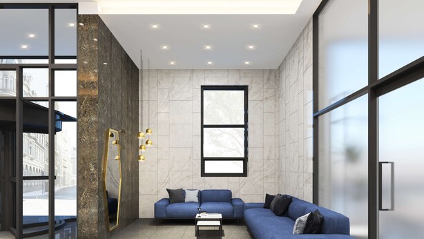 A modern living room with a sectional sofa, a coffee table, and pendant lighting. - Golden Tulip Essential Namgang (Jinju)