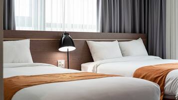 Deluxe Room, Multiple Beds (1 QueenBed & 1 TwinBed) | Desk, laptop workspace, blackout curtains, soundproofing