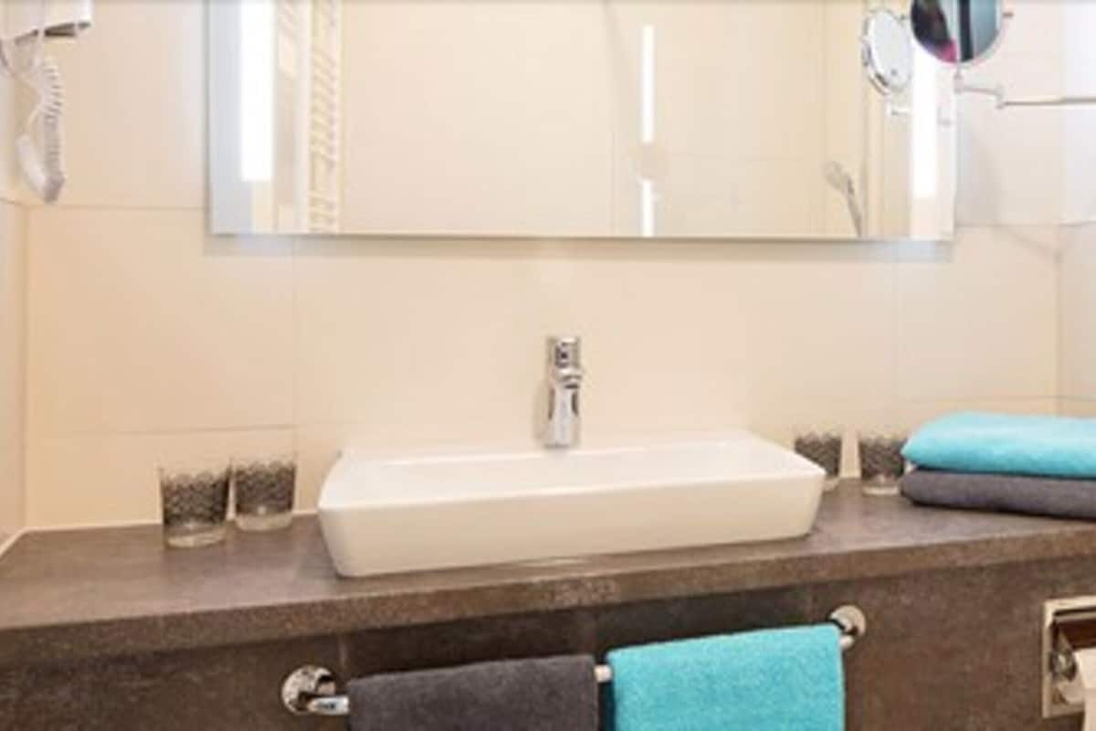 room, multiple beds | bathroom | shower, hair dryer, towels, shampoo