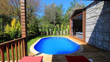 Outdoor pool, pool umbrellas, pool loungers