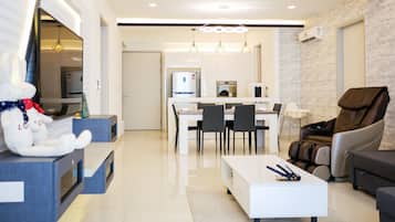 Apartment, 2 Bedrooms | Living area | 55-inch Smart TV with satellite channels, TV