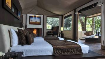 Luxury Suite, Non Smoking | Desk, iron/ironing board, bed sheets