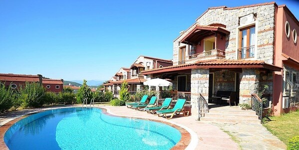 Outdoor pool, pool umbrellas, pool loungers