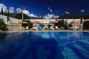 Outdoor pool, pool umbrellas, pool loungers