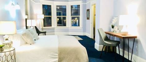 Family Room with car parking included | In-room safe, individually decorated, desk, blackout drapes