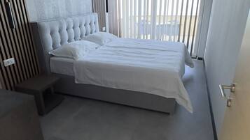 Deluxe Apartment, 2 Bedrooms, Non Smoking, Sea View | 2 bedrooms, premium bedding, soundproofing, iron/ironing board