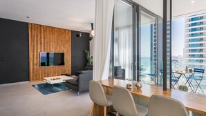 Royal Apartment, Ocean View | Living area | TV - Front of Beach next to RoyalBeach Hotel (Tel Aviv)