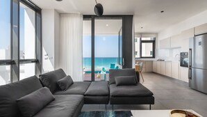 Royal Apartment, Ocean View | Living area | TV - Front of Beach next to RoyalBeach Hotel (Tel Aviv)