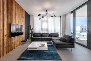 Royal Apartment, Ocean View | Living area | TV - Front of Beach next to RoyalBeach Hotel (Tel Aviv)