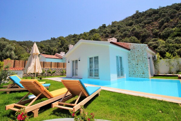 Outdoor pool, pool umbrellas, pool loungers