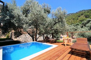 Outdoor pool, pool umbrellas, pool loungers