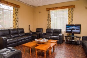 Standard Double or Twin Room, Garden View | Living area | Flat-screen TV