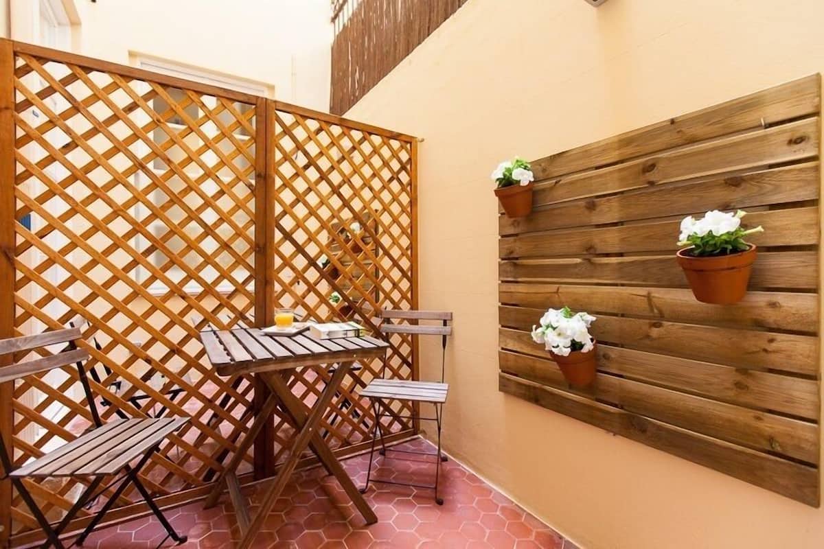 Economy tweepersoonskamer, patio | Terras