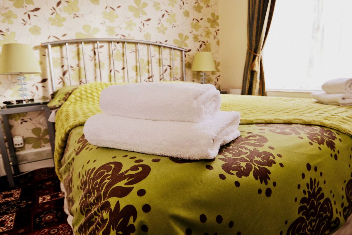 blackout curtains, iron/ironing board, free wifi, bed sheets