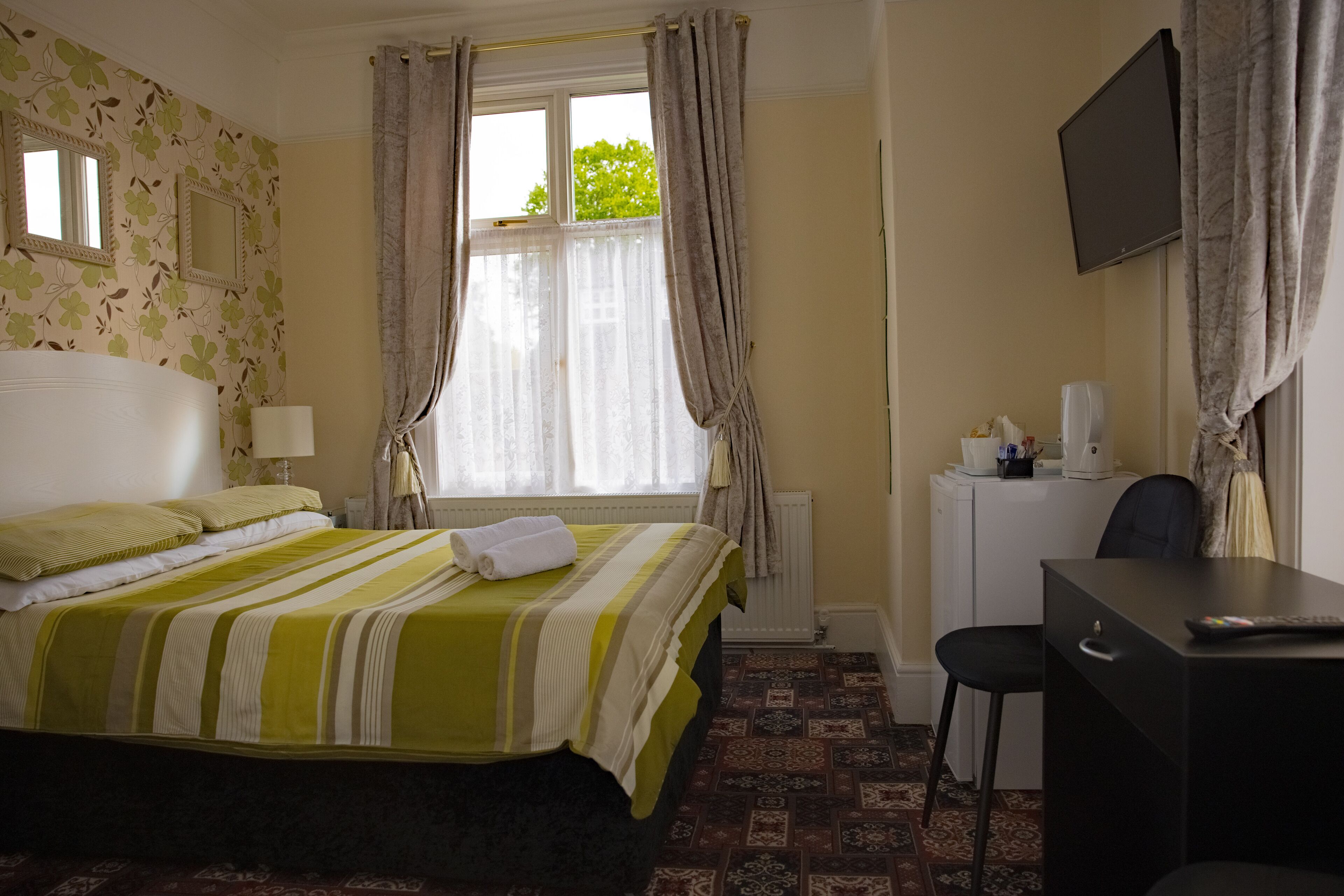 blackout curtains, iron/ironing board, free wifi, bed sheets