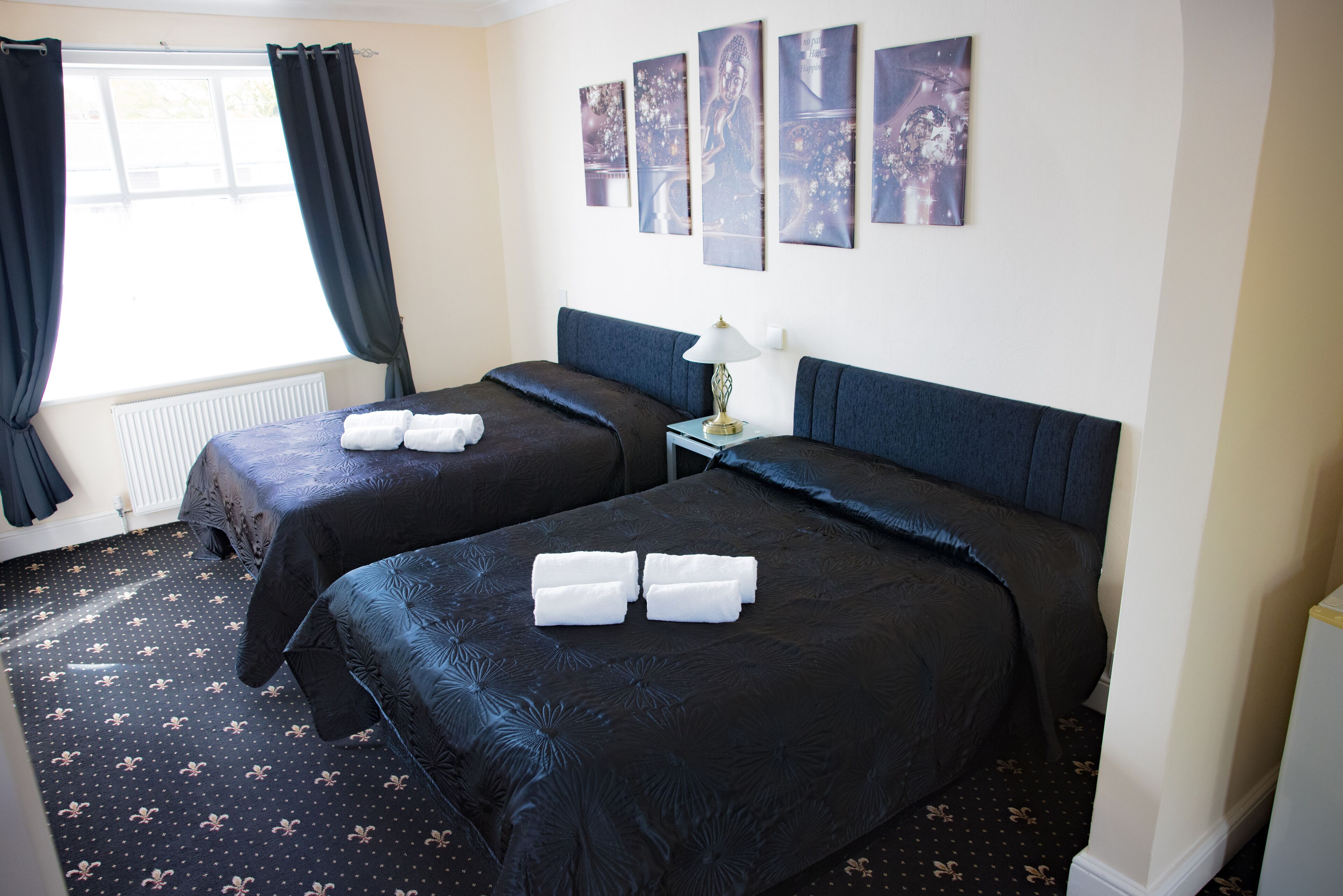 blackout curtains, iron/ironing board, free wifi, bed sheets