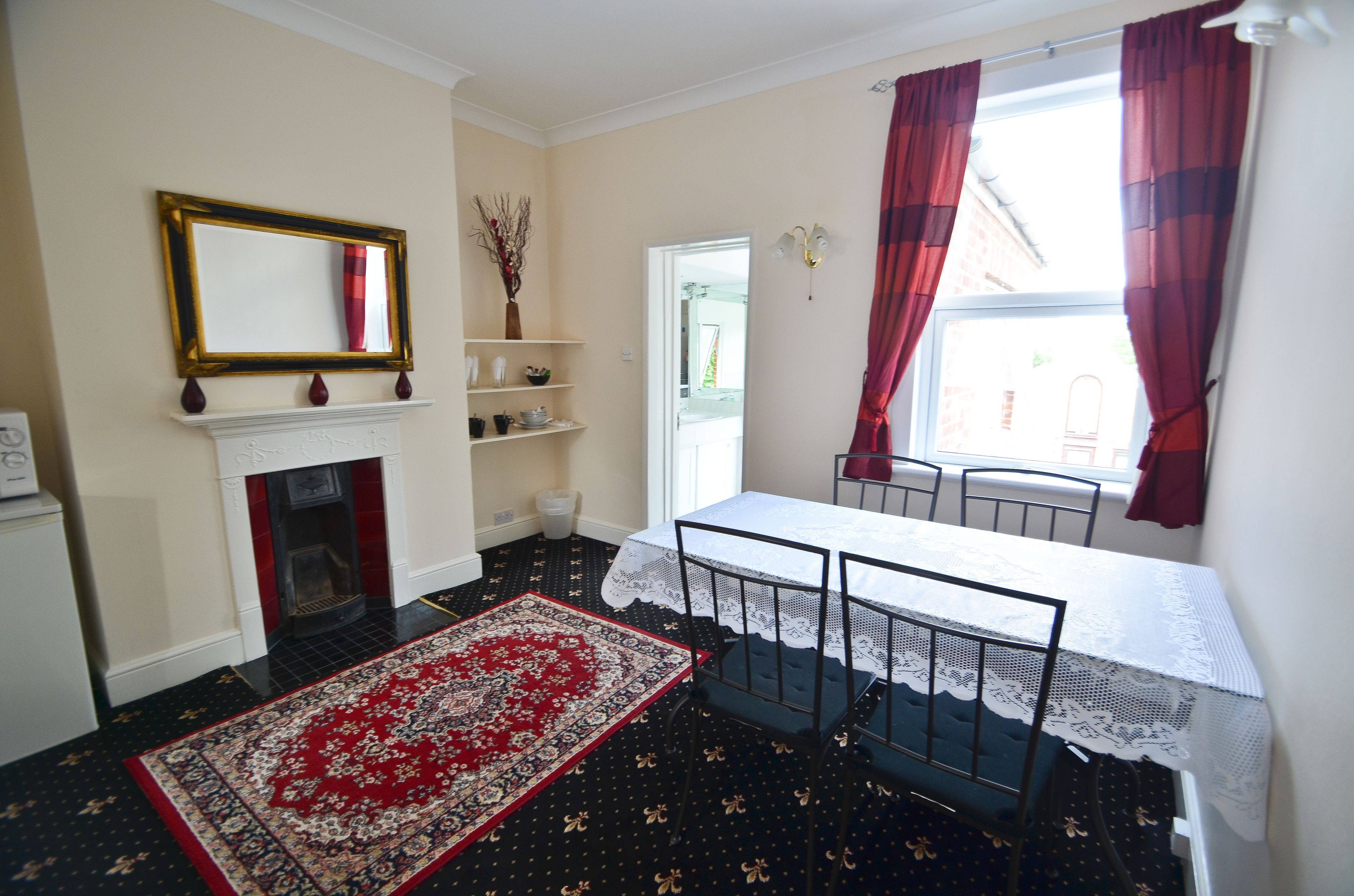 executive family room | blackout curtains, iron/ironing board, free wifi, bed sheets