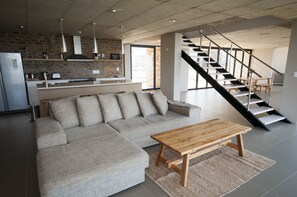 Deluxe House, 5 Bedrooms | Living room | Flat-screen TV, fireplace