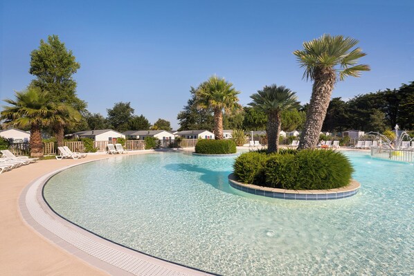 Indoor pool, outdoor pool, open 9:00 AM to 8:00 PM, pool umbrellas