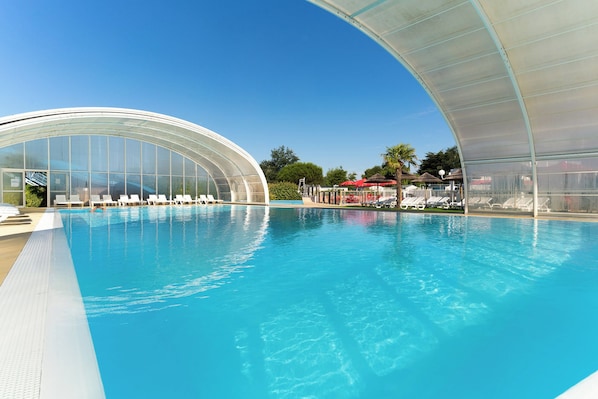 Indoor pool, outdoor pool, open 9:00 AM to 8:00 PM, pool umbrellas