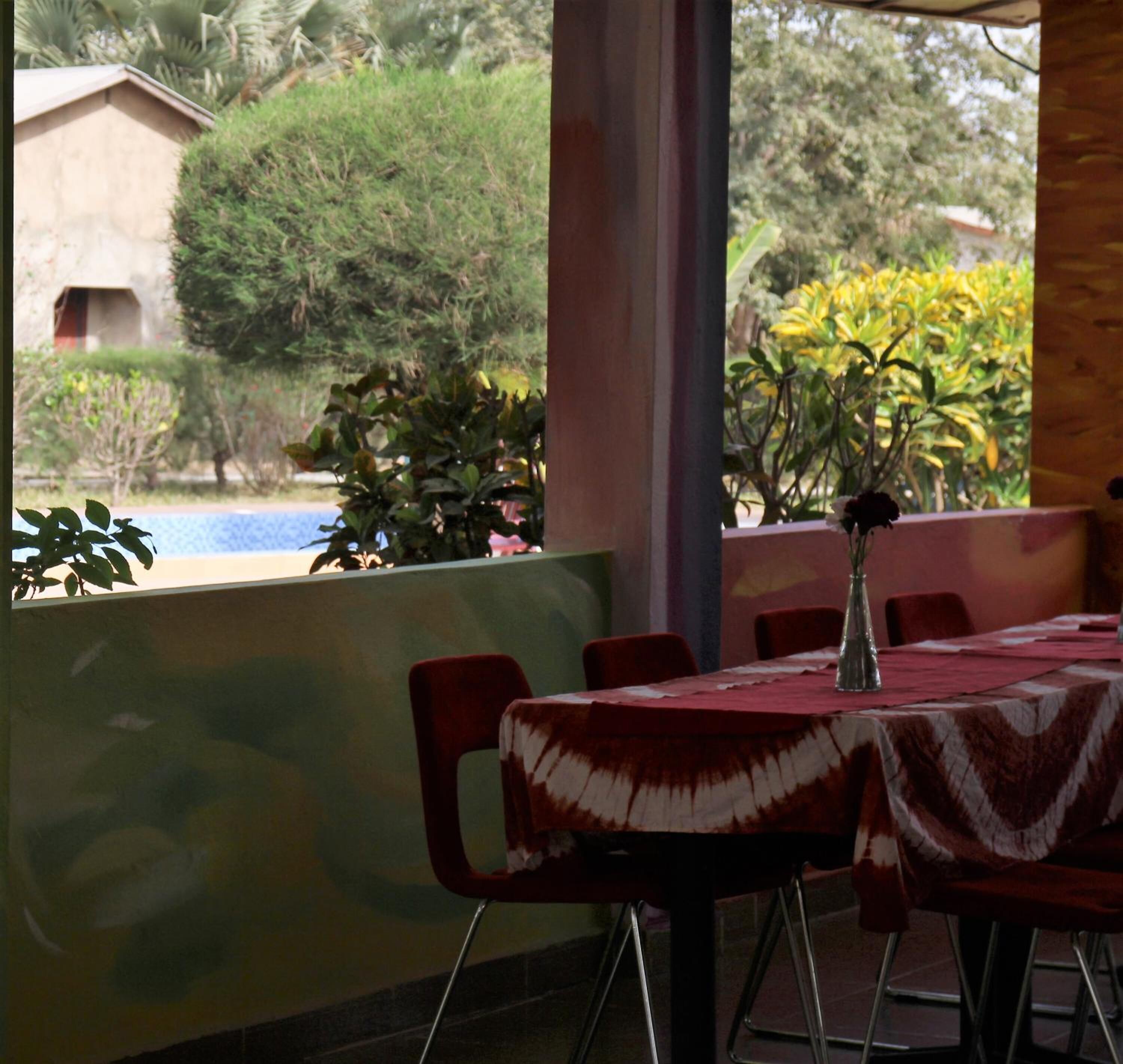 Breakfast, lunch, dinner served; local cuisine 