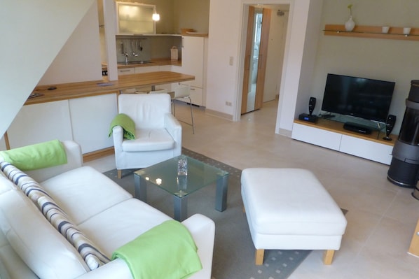Apartment, 2 Bedrooms | Living area | Flat-screen TV, fireplace