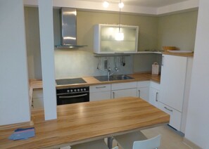 Apartment, 2 Bedrooms | Private kitchen | Fridge, microwave, oven, stovetop