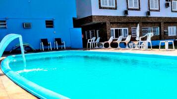 Outdoor pool, pool umbrellas, pool loungers