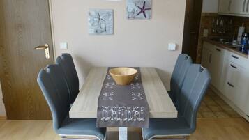 Apartment, 2 Bedrooms | Living area | Flat-screen TV