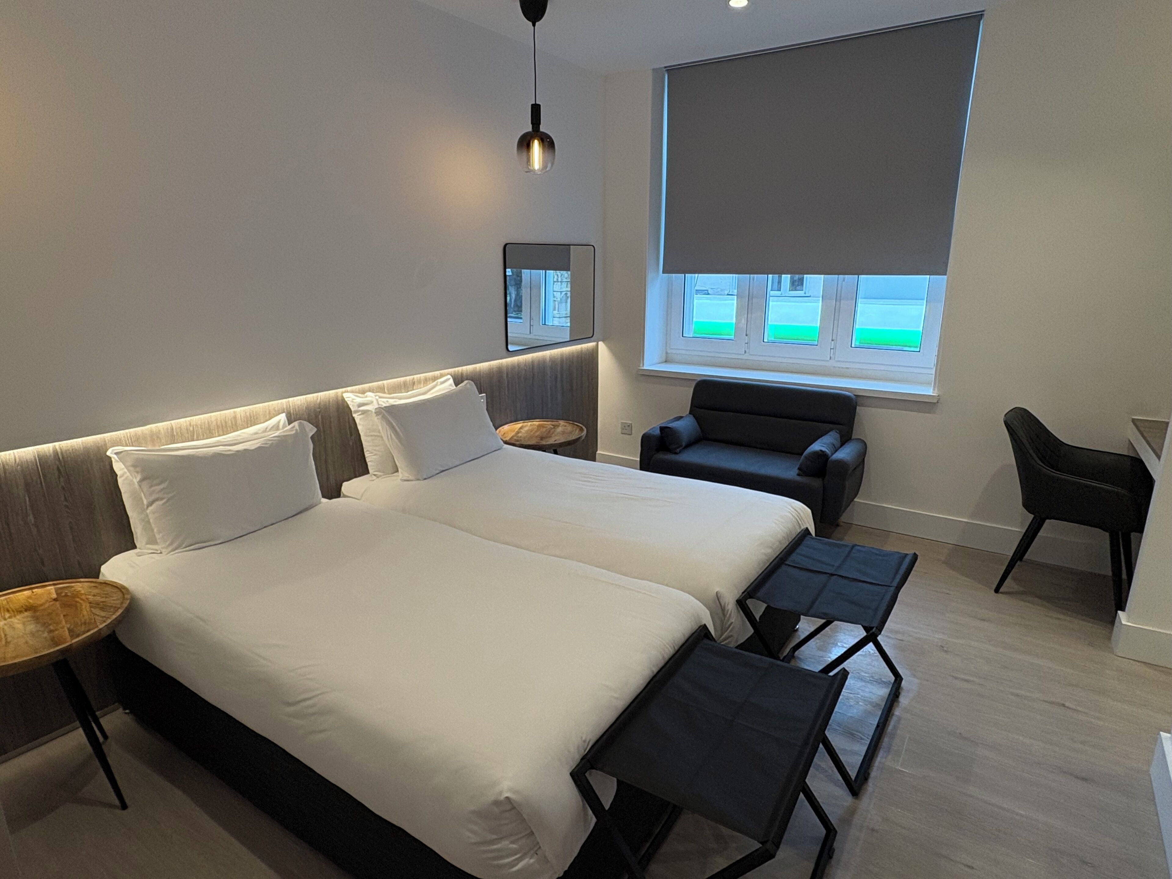 Deluxe Room | Minibar, iron/ironing board, free WiFi, bed sheets