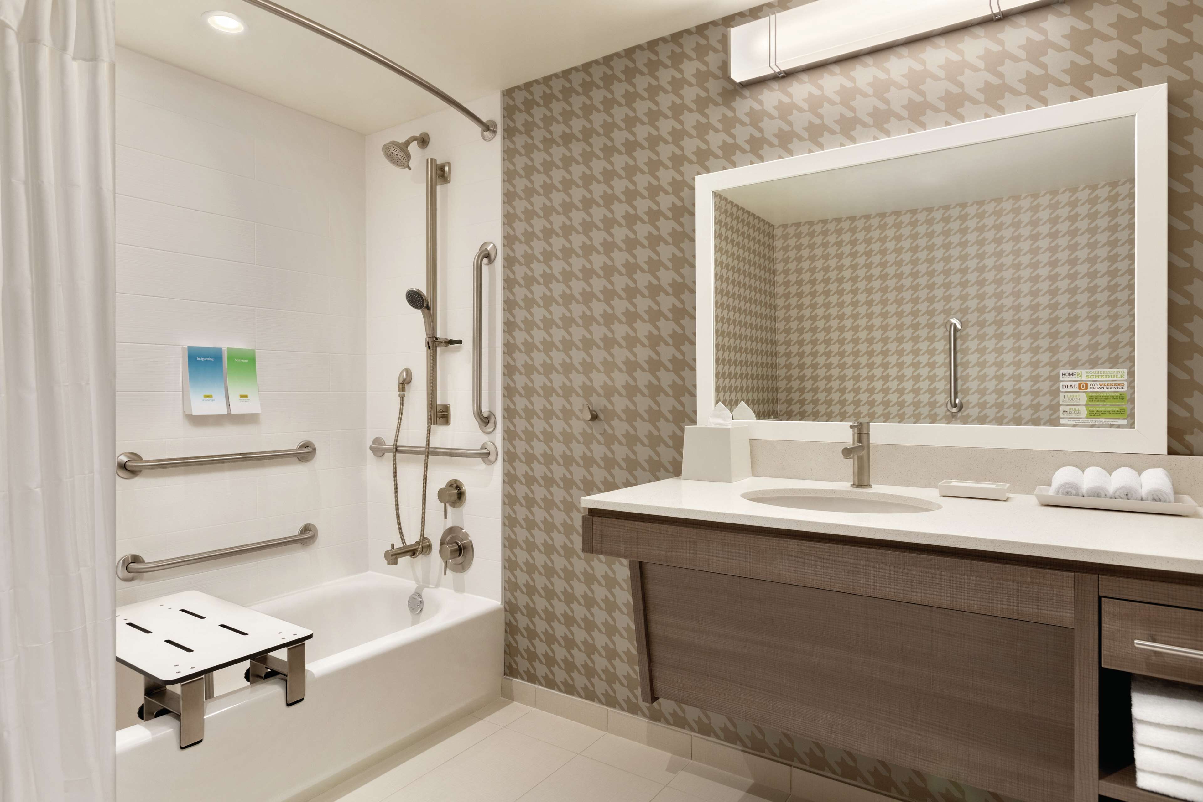 designer toiletries, hair dryer, towels, soap