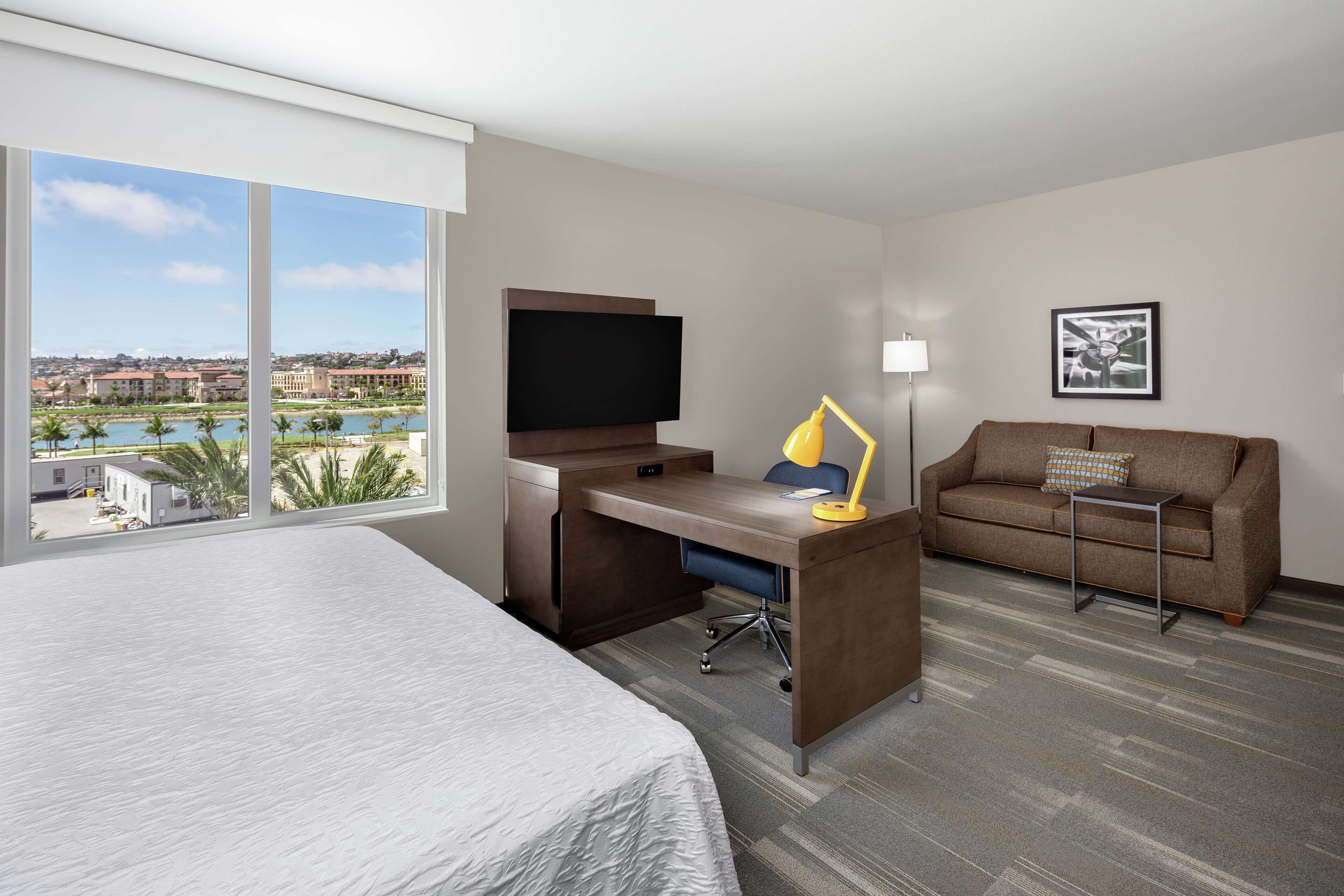 suite, 1 king bed (water view) | desk, blackout curtains, soundproofing, iron/ironing board