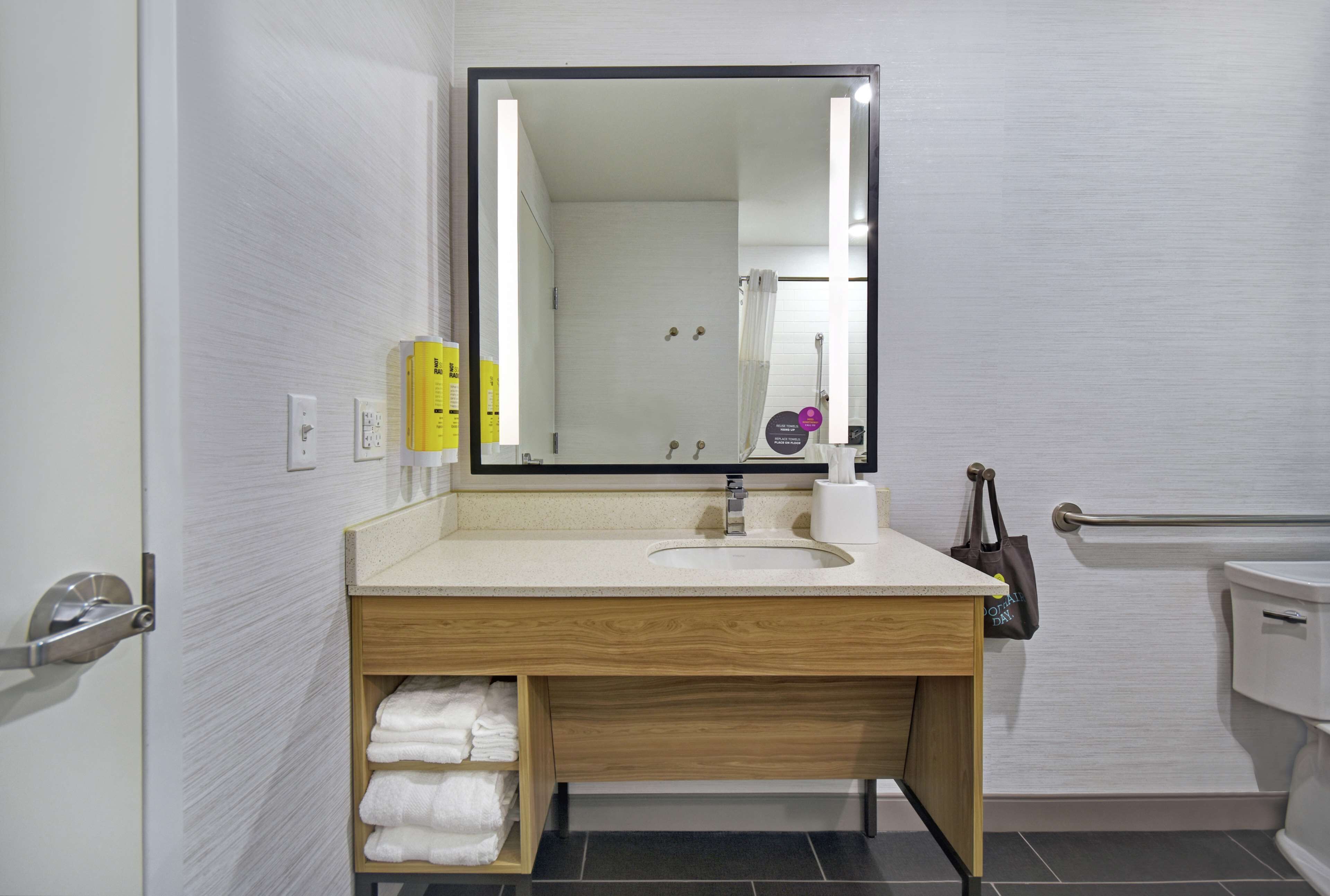 shower, designer toiletries, towels