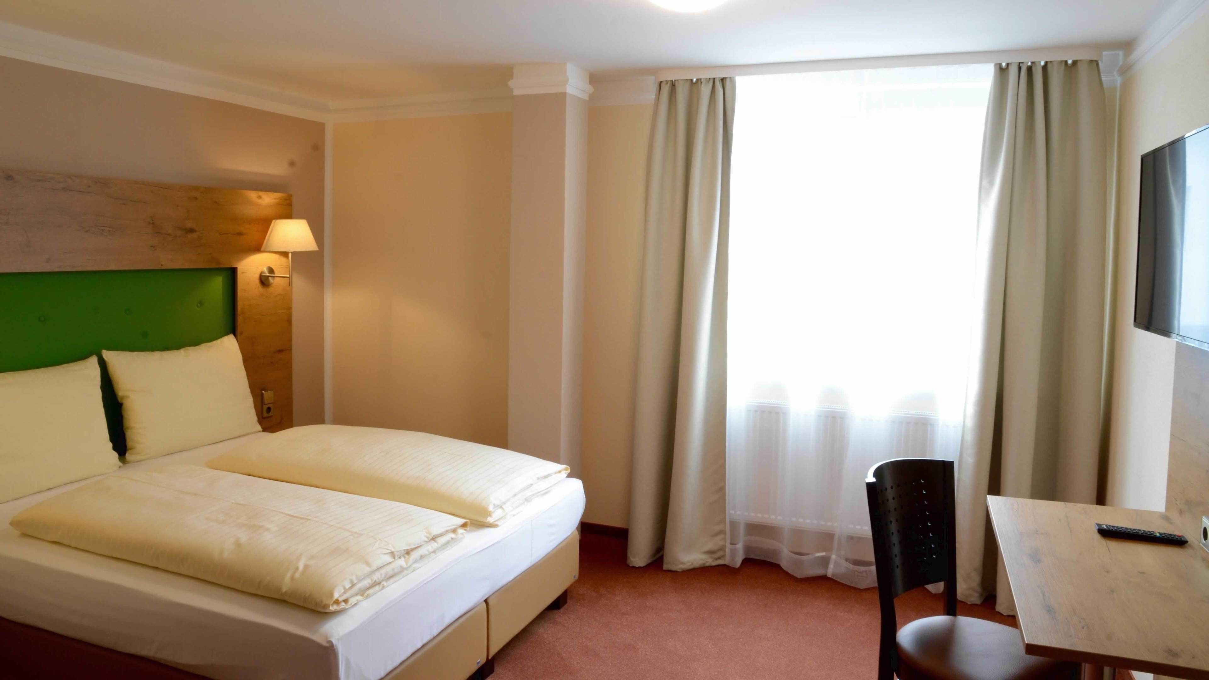 Premium bedding, individually decorated, individually furnished, desk