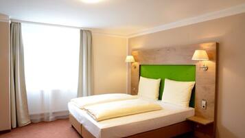 Premium bedding, individually decorated, individually furnished, desk