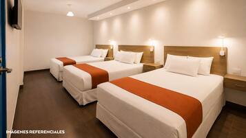 Suite familiar, varias camas, terraza | Ropa de cama de alta calidad, edredones de plumas, minibar