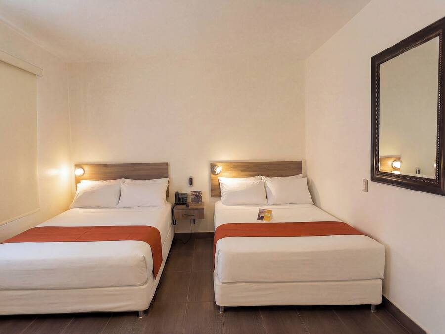 Chambre triple supérieure | Literie de qualité, couette en duvet, décor unique, ameublement unique