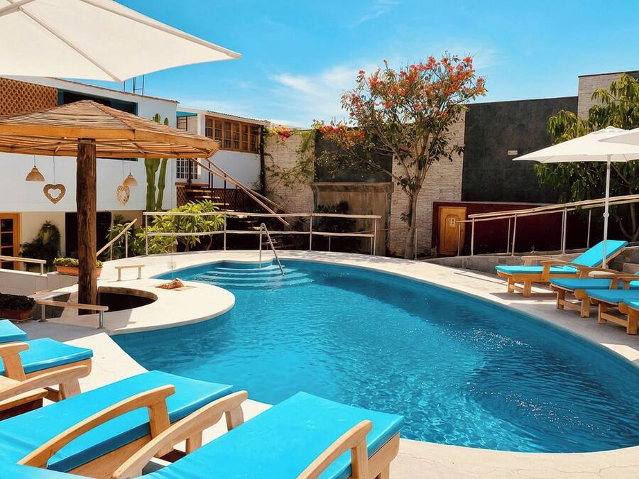 2 outdoor pools, open 7:00 AM to 10:00 PM, pool umbrellas, pool loungers