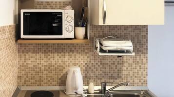 Studio (Nika Family Apartments - Basic Studio) | Private kitchenette | Fridge, microwave, stovetop, electric kettle