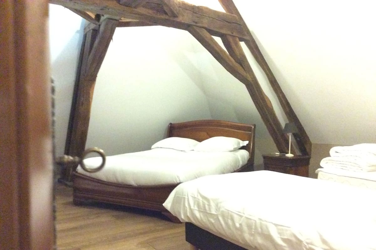Premium bedding, blackout curtains, iron/ironing board (on request)