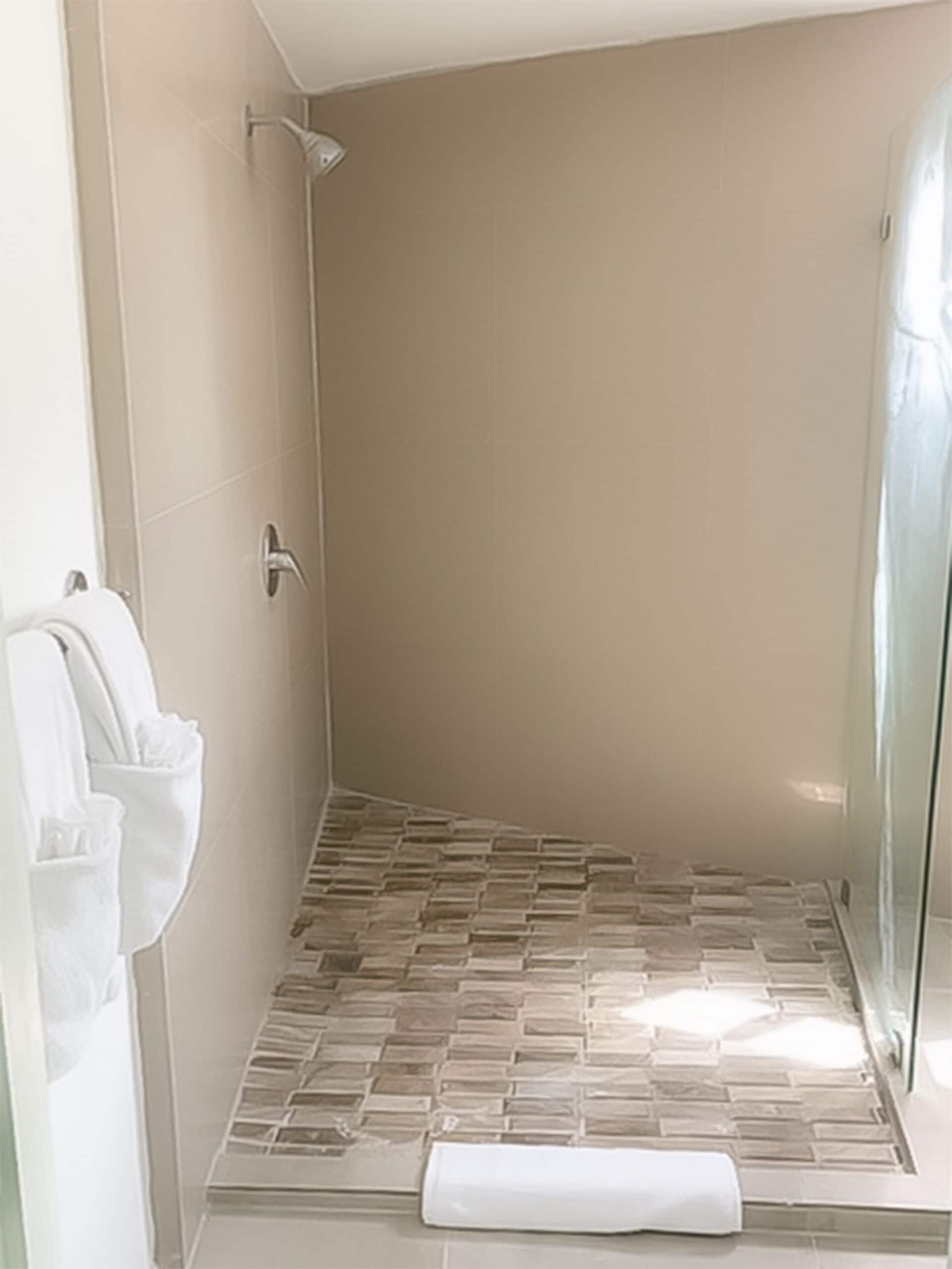 superior double room, multiple beds | bathroom | shower, free toiletries, hair dryer, towels