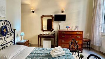 Quadruple Room | Premium bedding, down duvets, desk, laptop workspace
