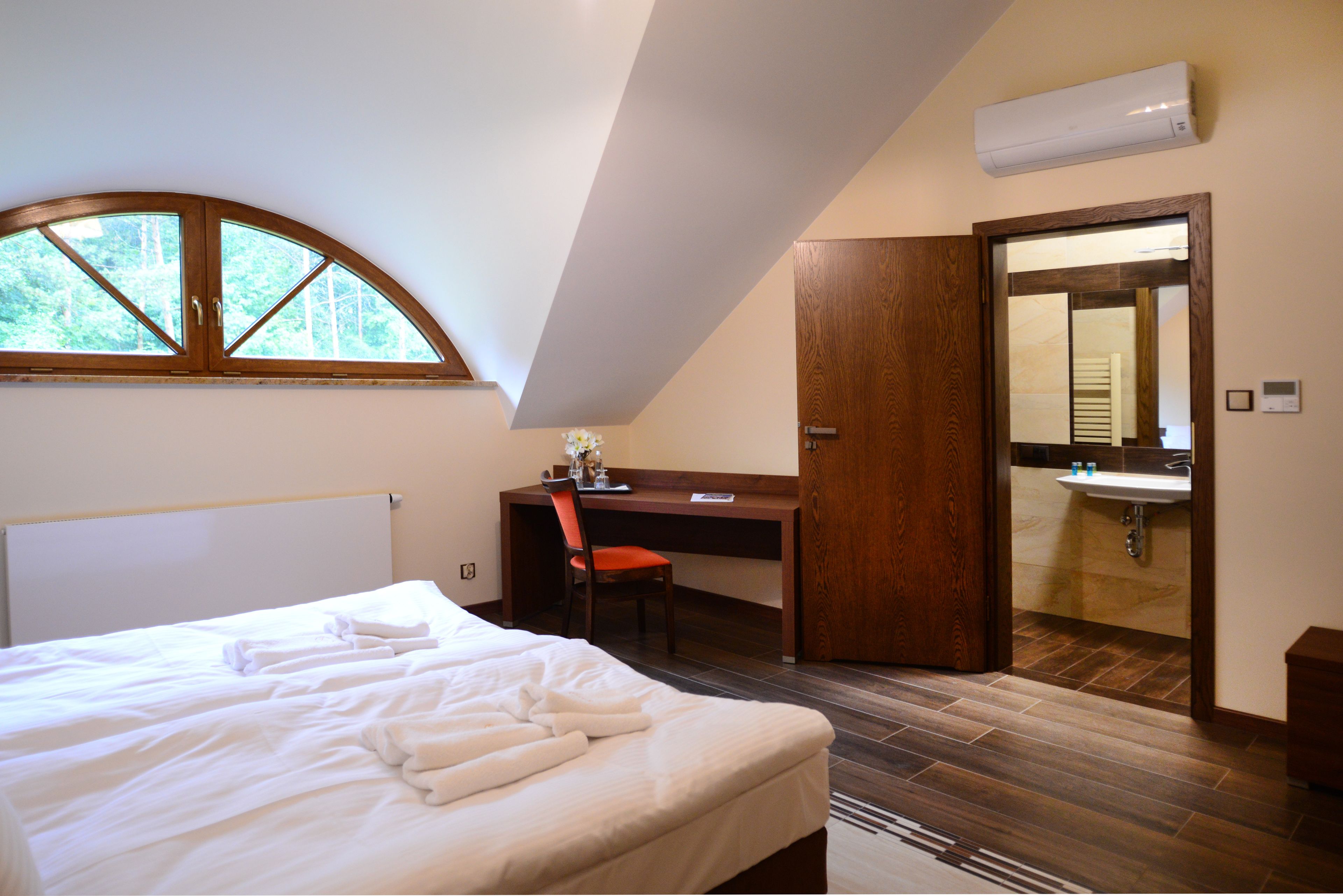 premium bedding, memory-foam beds, desk, blackout curtains