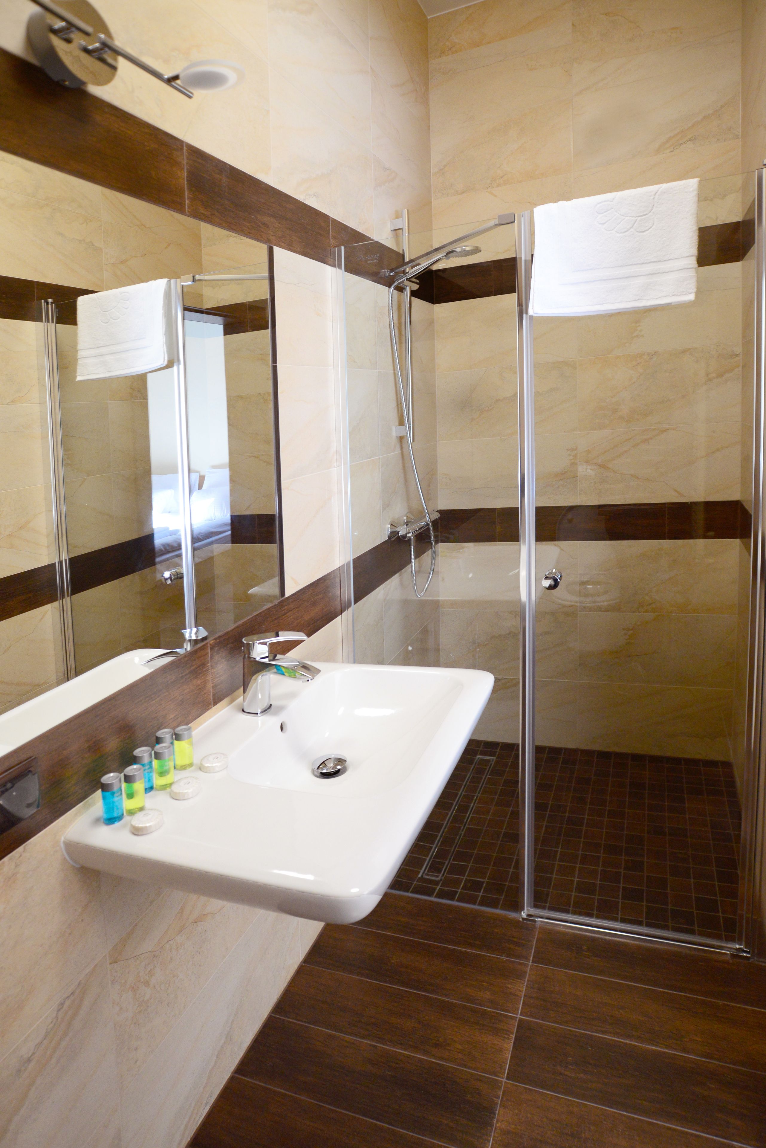 basic triple room, multiple beds, non smoking | bathroom | shower, rainfall showerhead, free toiletries, towels